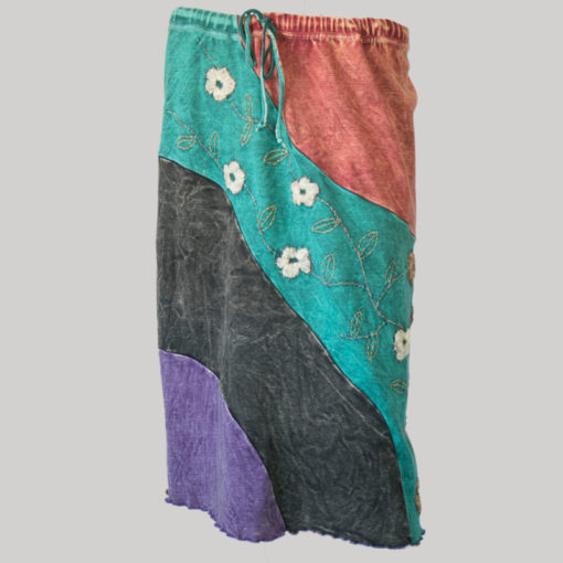 Gypsy skirt with asymmetrical printed panel patches stone wash front