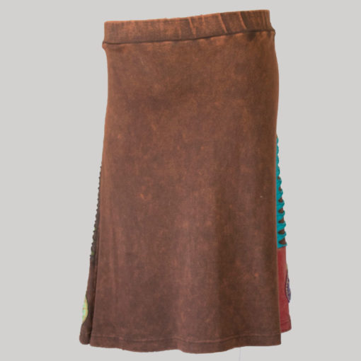 Gypsy rib skirt with asymmetrical razor cut patches and hand work back