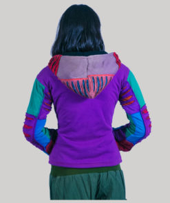 Women's jacket with asymmetrical razor cut patches