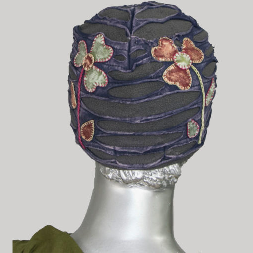 Symmetrical razor cut flower hand work cap for women