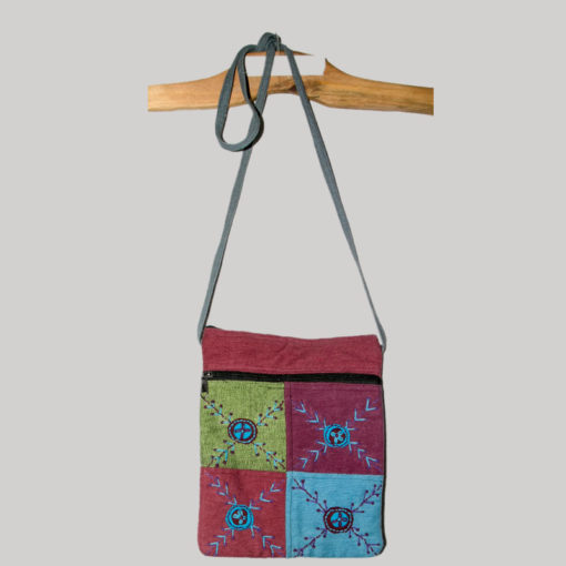 Women's passport bag patched with heavy cotton and hand work